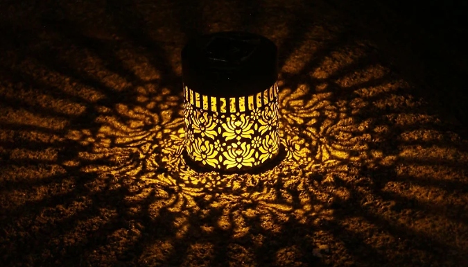 2 or 4-Pack of Solar Wall-Mounted Hollow-Out Projection Lights - 3 Designs!